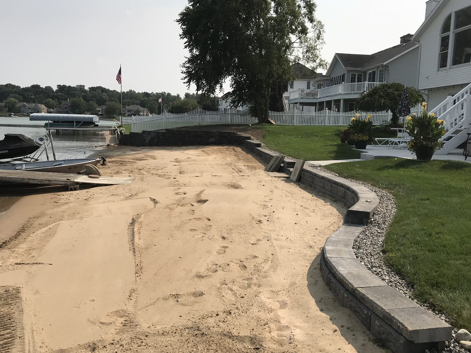 Completed seawall and beach restoration on a West Michigan lakefront property
